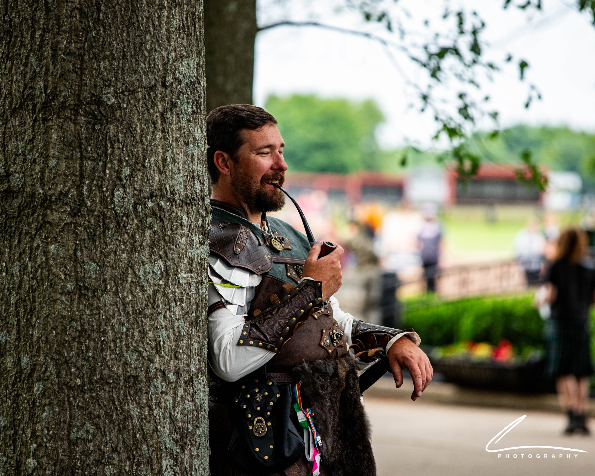 Viking and shieldmaiden costumed faire guests