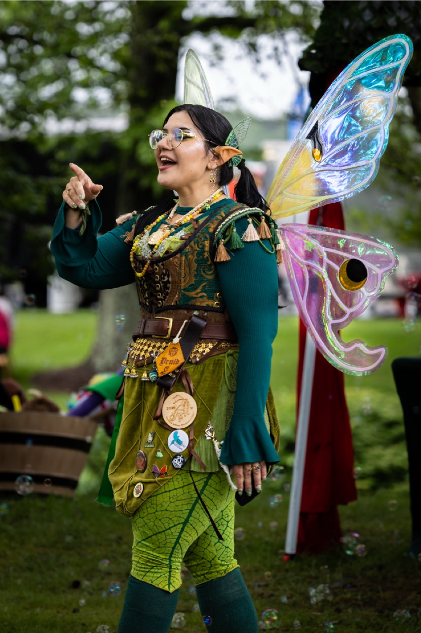 Faire guests in imaginative fantasy costumes
